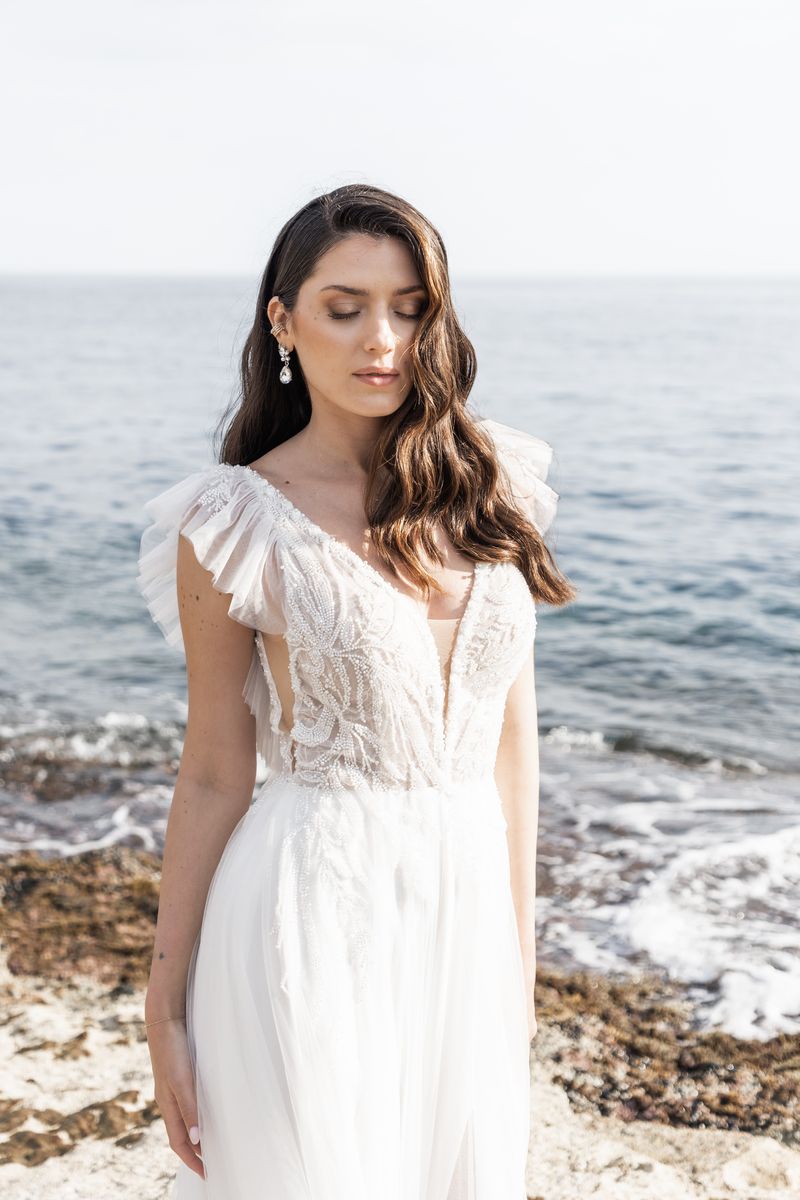 Robe de mariée bohème chic décolleté dans le dos