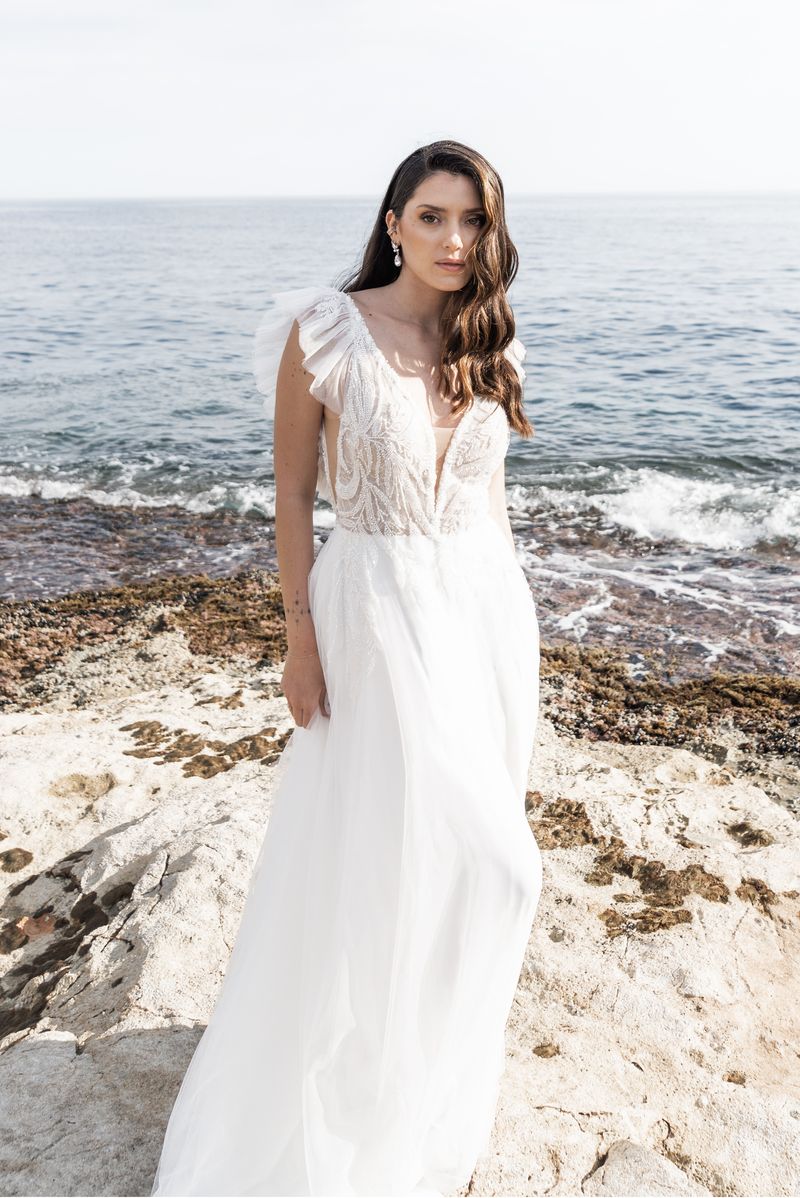 Robe de mariée bohème chic décolleté dans le dos